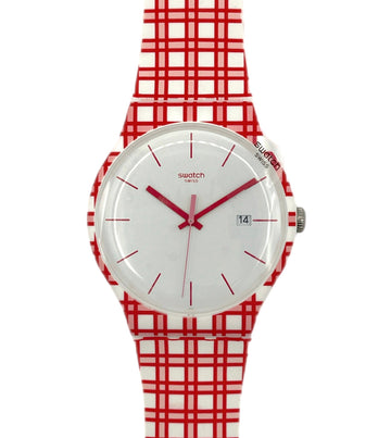 Swatch watch with red and white checkered strap on a white background