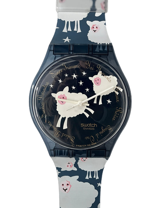 Swatch watch with sheep design on a white background
