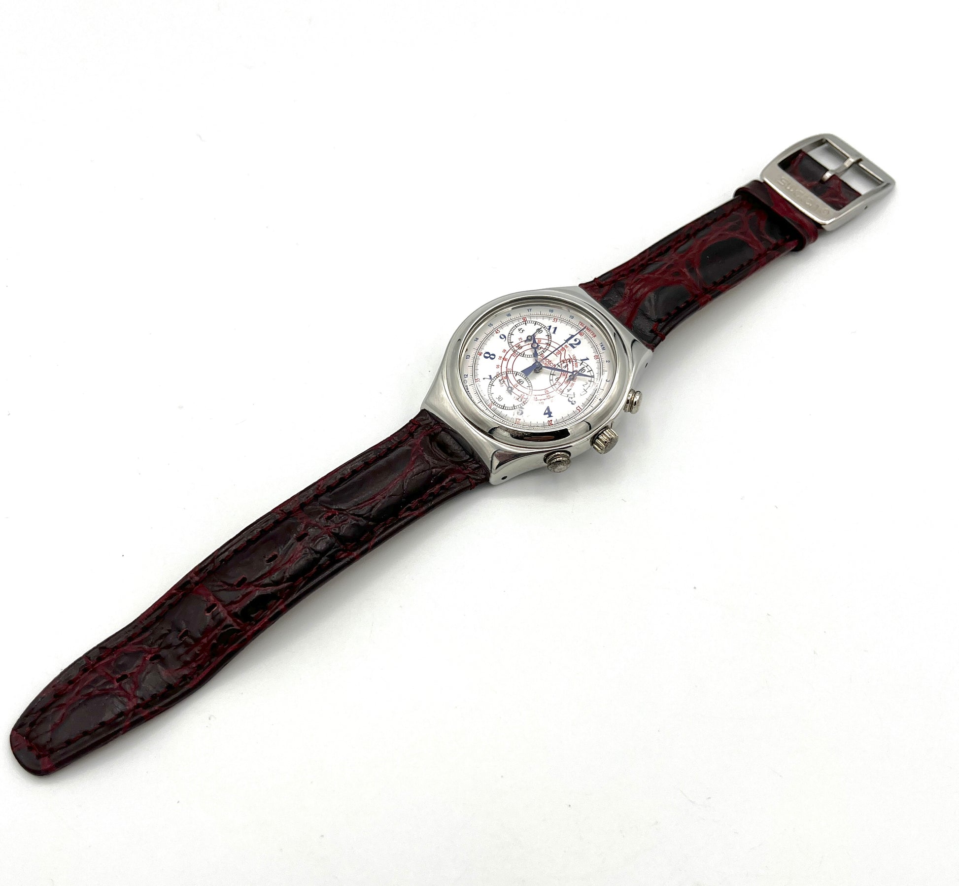 Watch with a brown strap on a white background