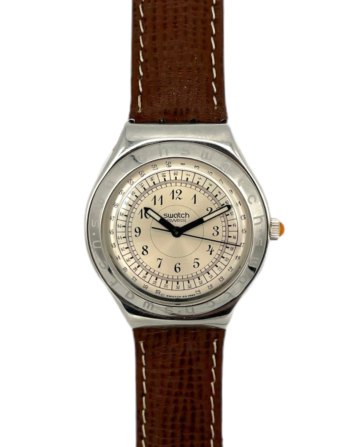 Swatch watch with brown strap on a white background