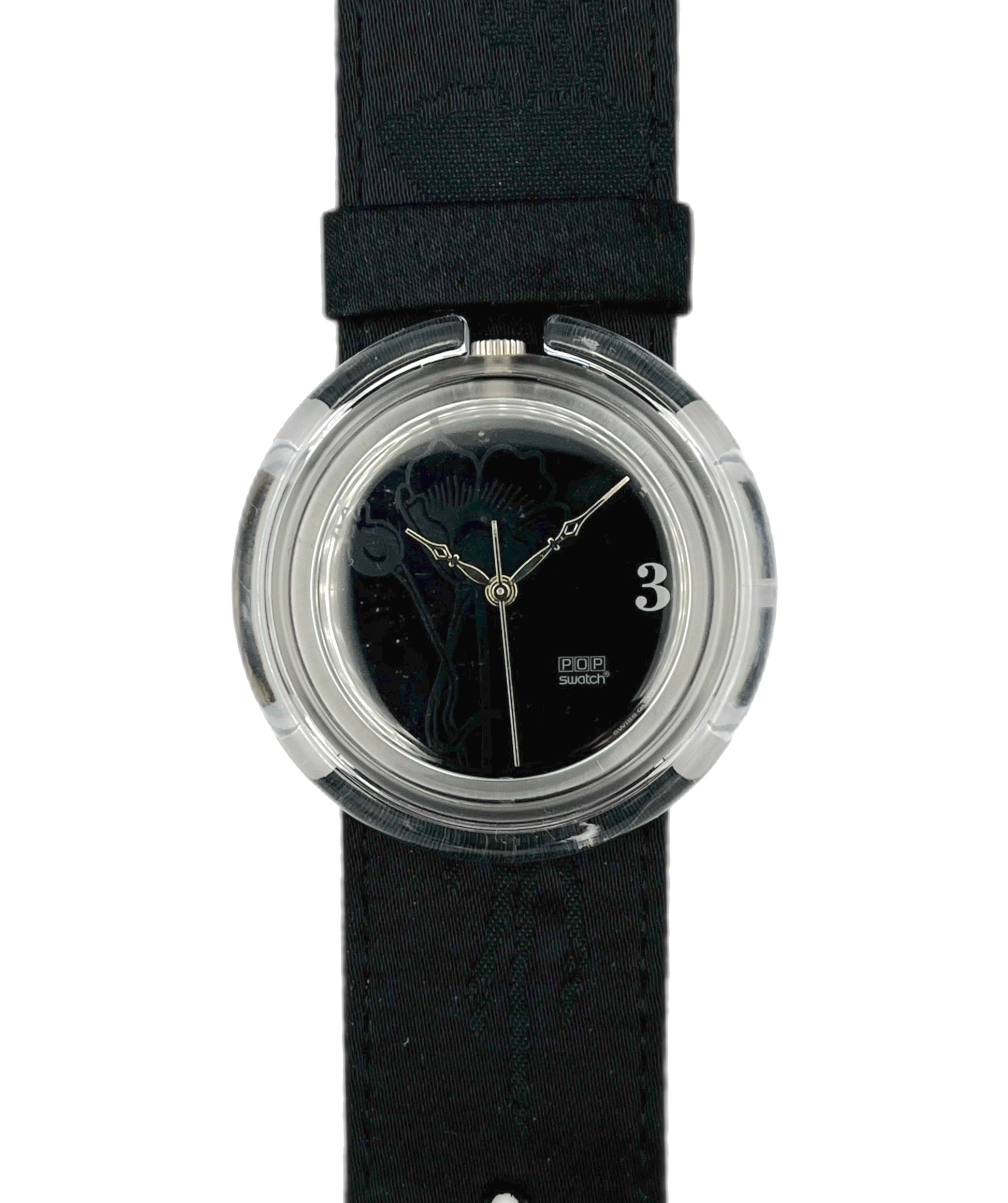 Black wristwatch with a clear case on a white background