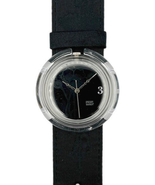 Black wristwatch with a clear case on a white background