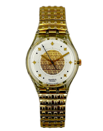 Gold Swatch watch on a white background