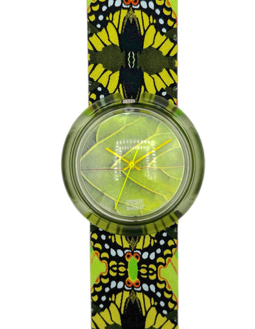 Watch with a butterfly patterned strap on a white background