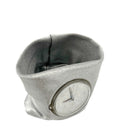 Gray fabric wristband with a clock face on a white background