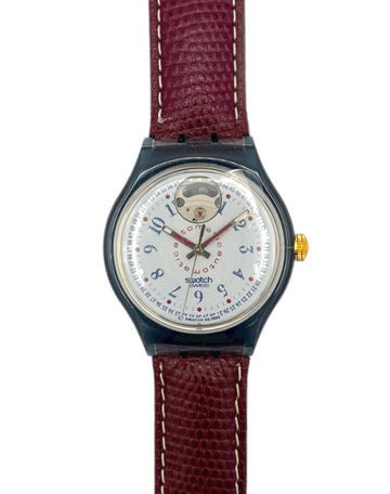 Watch with a brown strap on a white background