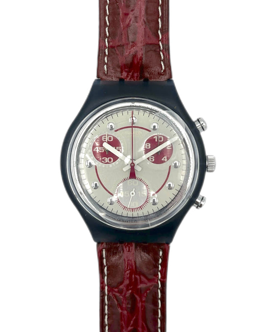 Watch with a red strap on a white background