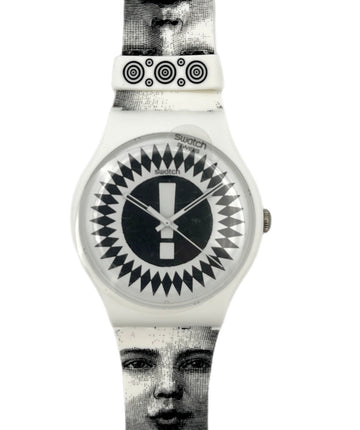 Watch with black and white patterned strap and face on a white background