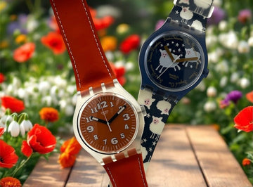 A new, unopened replacement band for a Pop Swatch watch, featuring a vibrant orange textile strap with a matching orange dial, packaged in a clear plastic case.