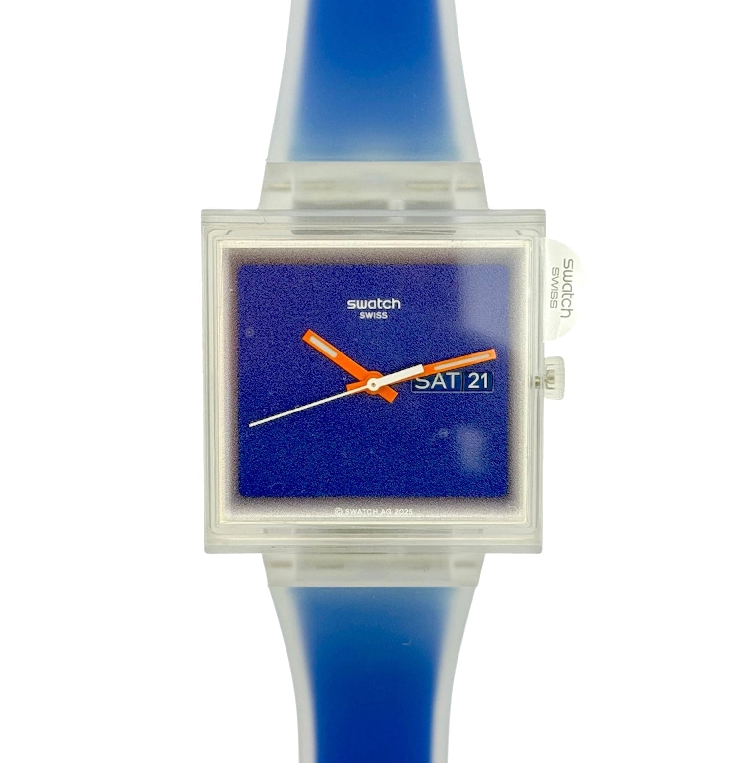 Swatch Swiss wrist watch with a translucent blue silicone strap, a clear square case, and a textured blue dial featuring orange and white hands.