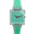 Swatch square analog watch with a mint green silicone strap, clear plastic case, and matching mint green dial with red hands.