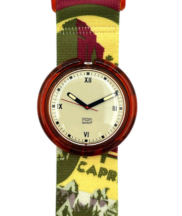 Watch with a wooden case and colorful strap on a white background