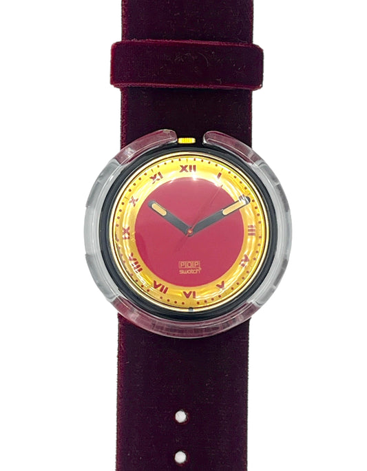 Watch with a red face and purple strap on a white background