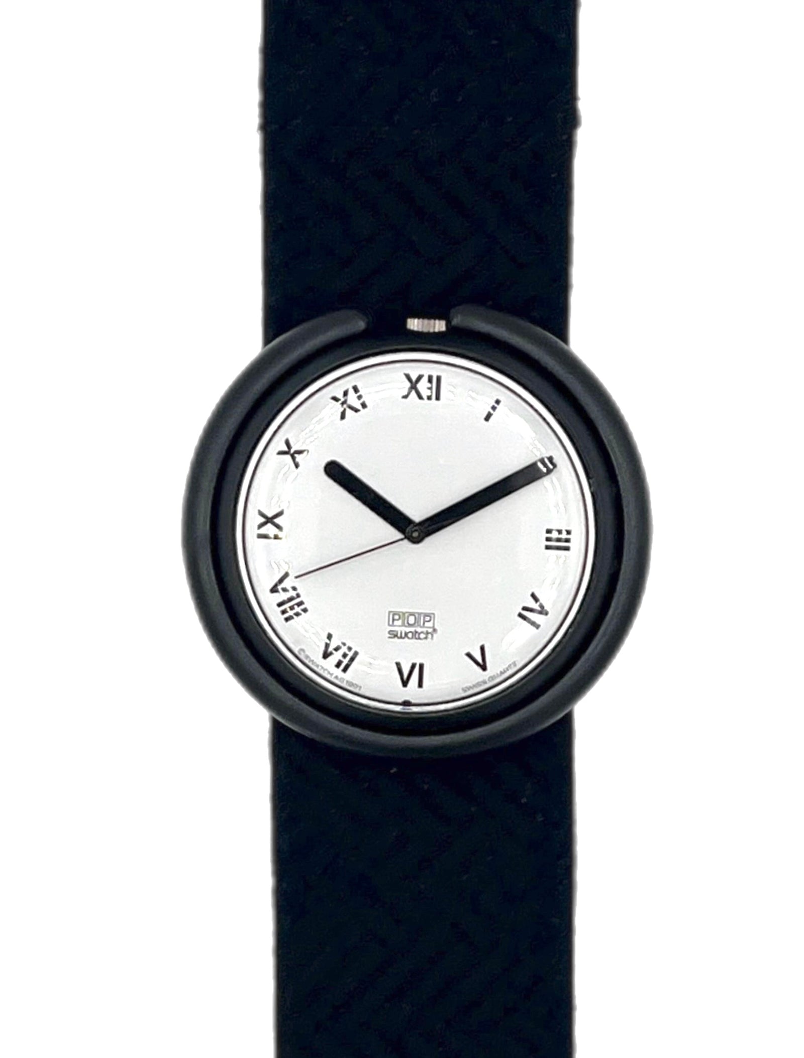A minimalist wristwatch with a black round case, black hands, and black Roman numeral hour markers on a white dial, paired with a black woven-texture strap, shown against a plain white background.