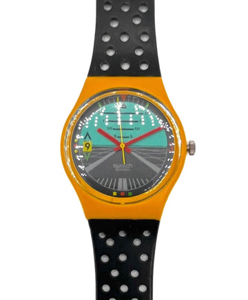 Colorful watch with a black and orange strap on a white background