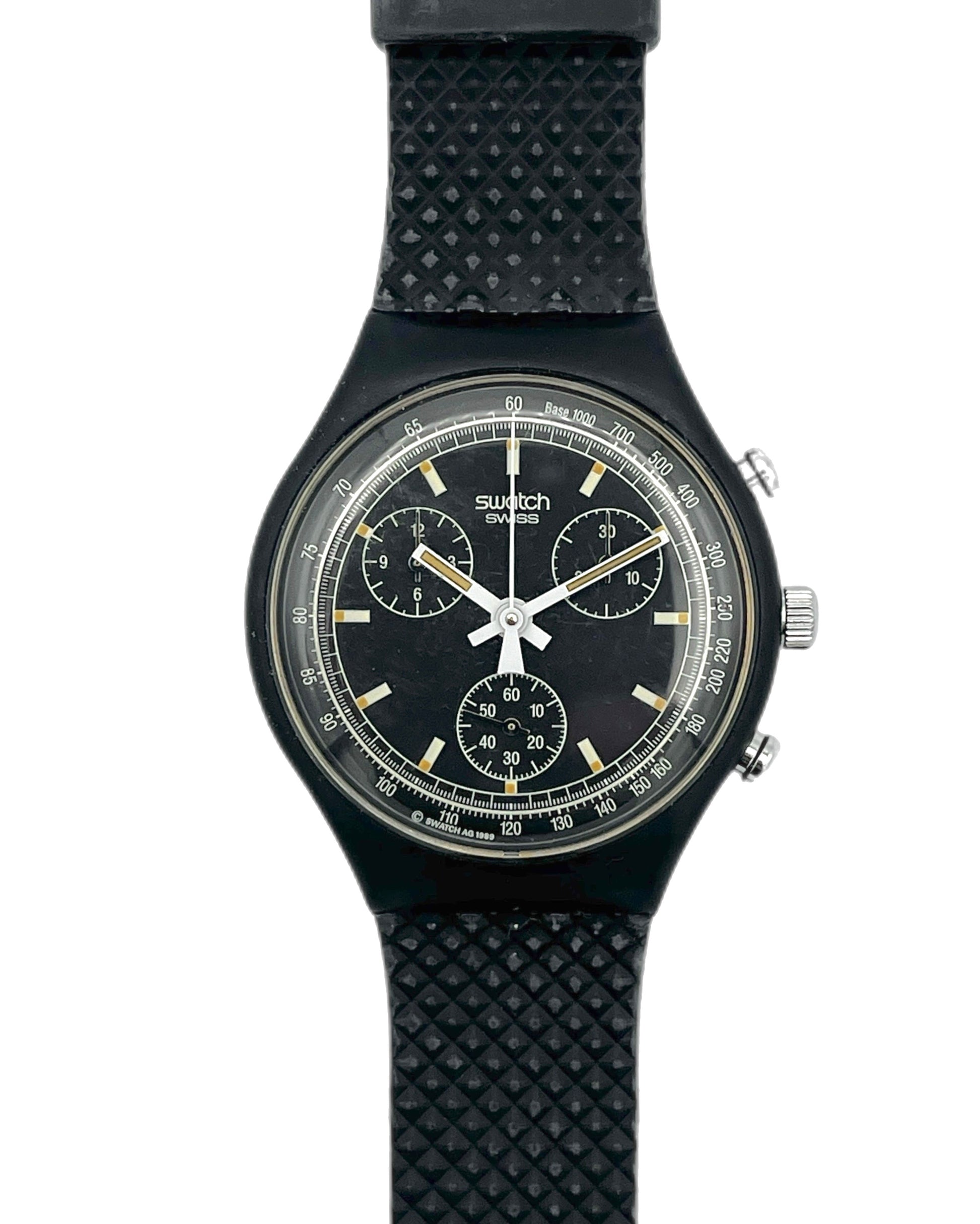 Black Swatch watch with detailed face on a white background