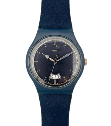 Blue Swatch watch with a white background