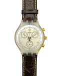 Swatch watch with brown leather strap on a white background