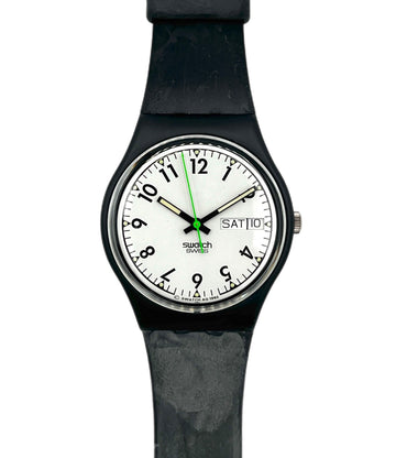Black wristwatch with a white face displaying the brand 'Swatch'.
