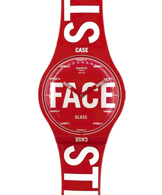 Red Swatch watch with white text on a white background