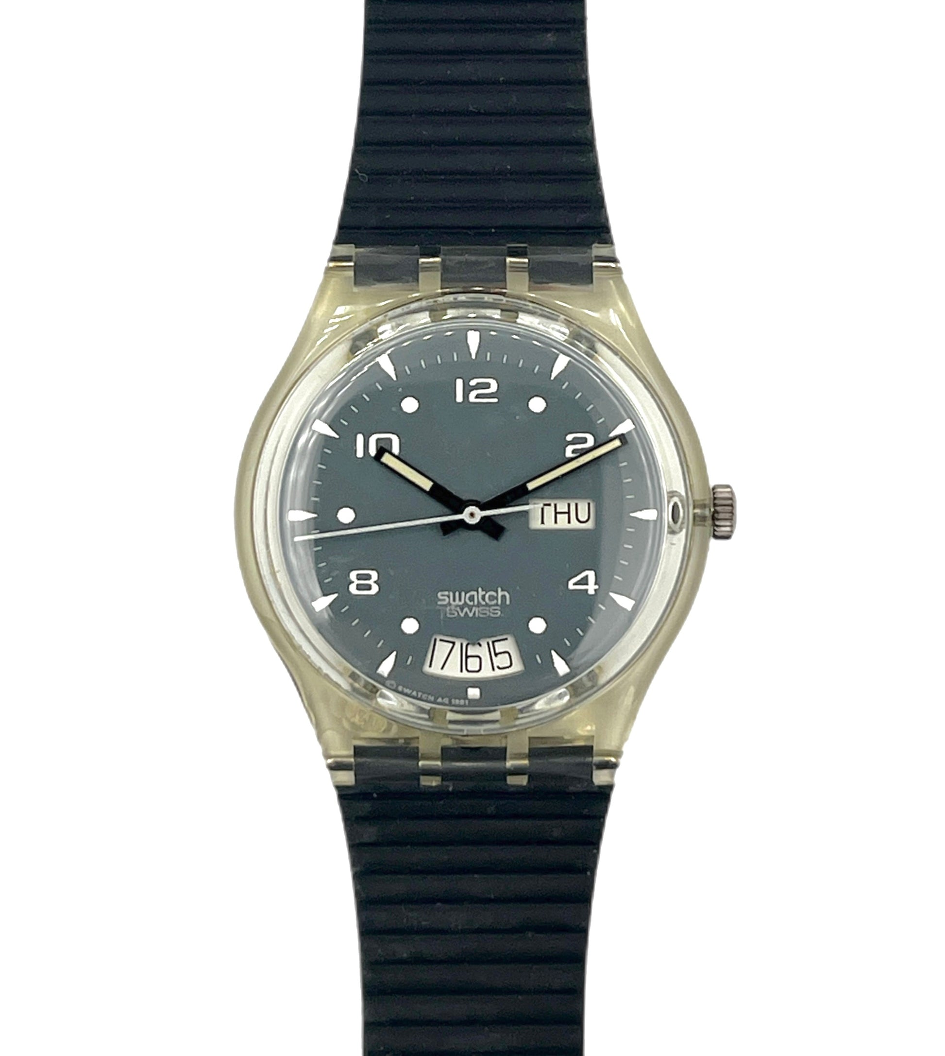 Swatch watch with black strap and clear case on a white background