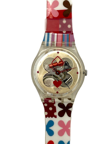 Colorful watch with butterfly pattern strap on a white background