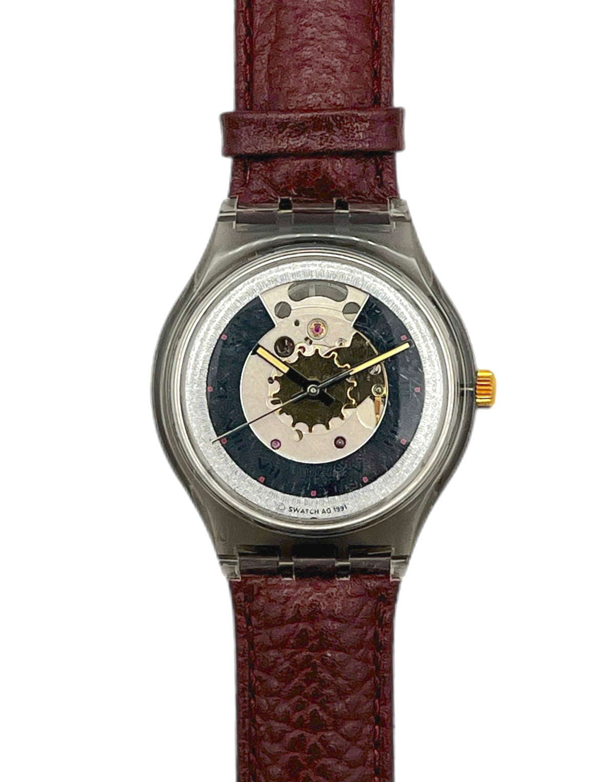 Watch with a brown leather strap and visible mechanical components on a white background