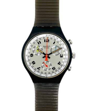 Swatch watch with a green strap on a white background