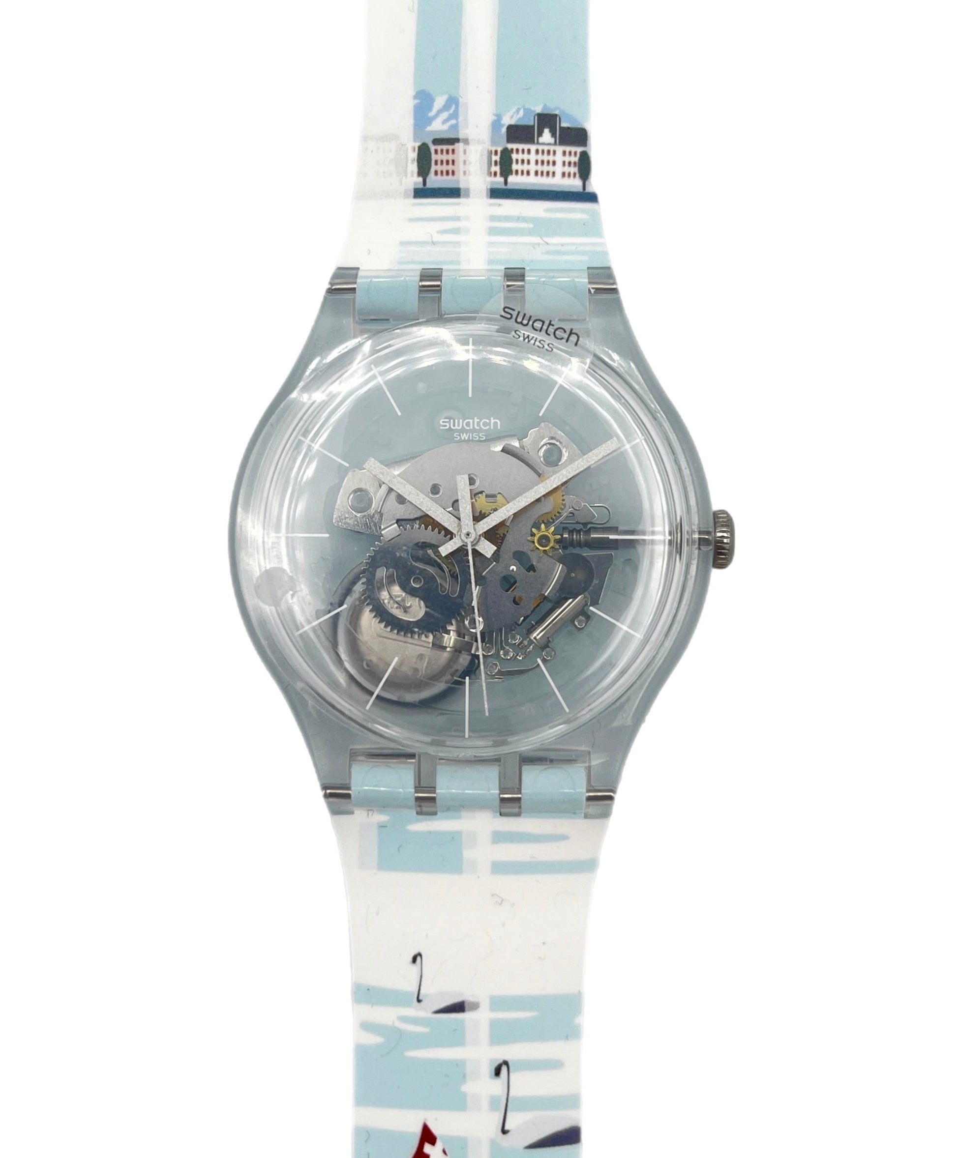 Swatch watch with a transparent face and colorful strap on a white background