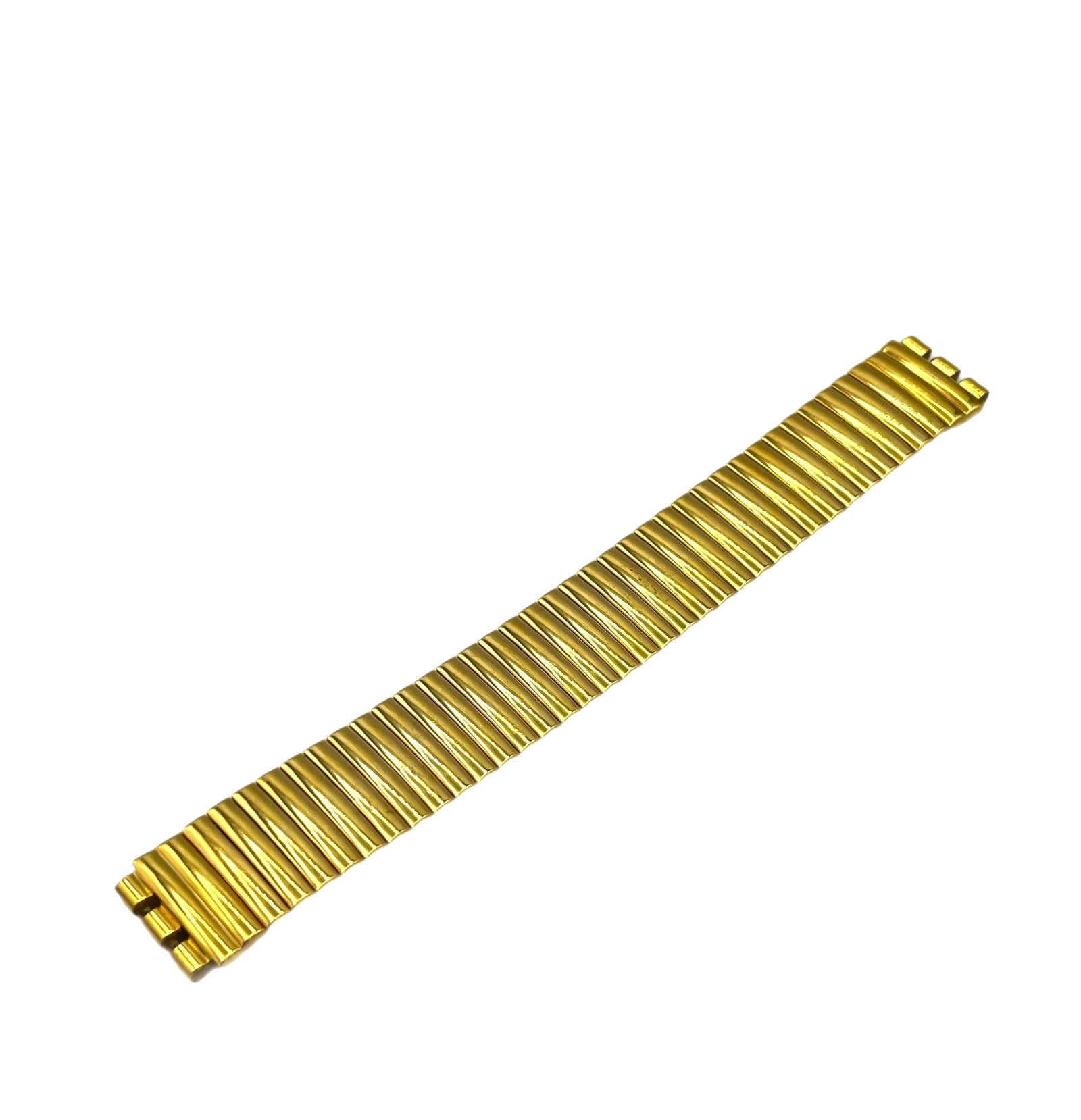 Gold metal watch strap on a white background